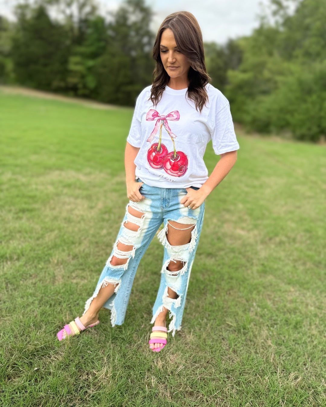 High Waisted Bleached Heavily Distressed Wide Leg Jeans